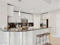 More Details about MLS # 6867250 : 945 E PLAYA DEL NORTE DRIVE#3009