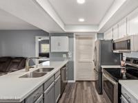 More Details about MLS # 6876057 : 520 N STAPLEY DRIVE#256